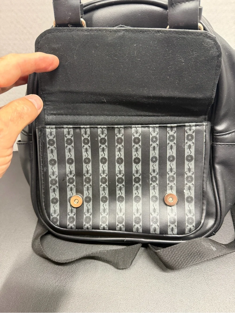 Mini Black Crest Backpack with Front Buckle Pocket